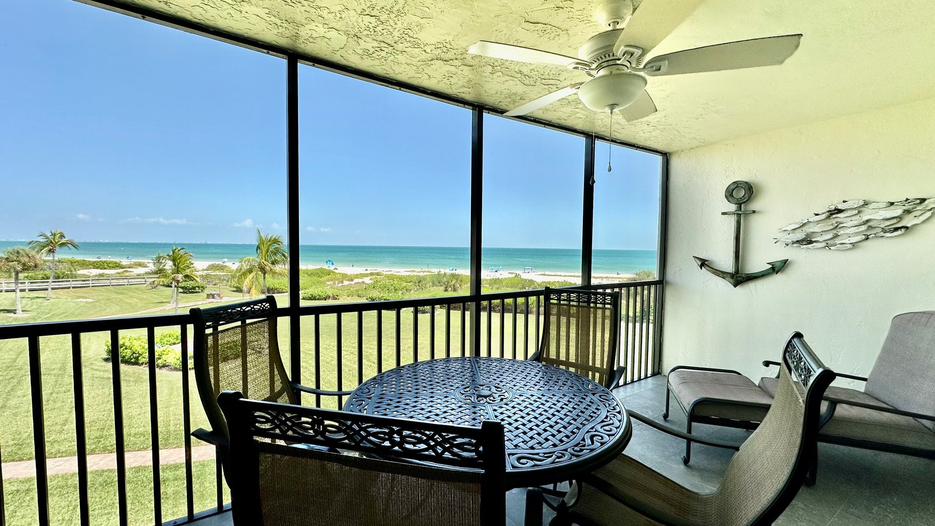 Enjoy coffee, cocktails a good book & more on the gulf view lanai.